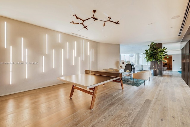 480 NE 31st St Unit 4804, Miami, FL 33137 - recreation room with light wood-style floors and baseboards