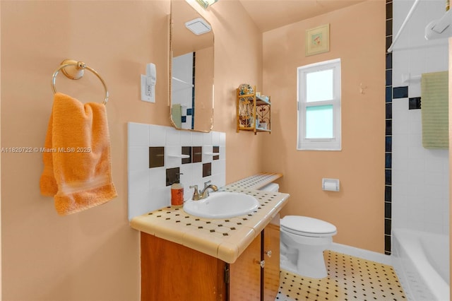 1521 Funston St, Hollywood, FL 33020 - bathroom featuring vanity, backsplash, tile patterned floors, and bathing tub / shower combination