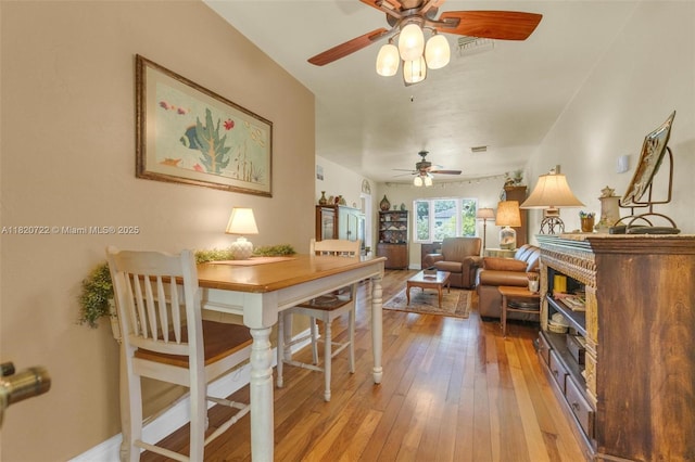 1521 Funston St, Hollywood, FL 33020 - dining area featuring ceiling fan and light wood finished floors