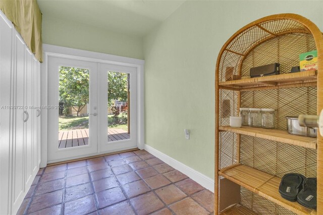 1521 Funston St, Hollywood, FL 33020 - doorway with baseboards and french doors