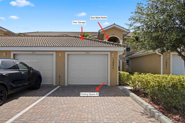 1051 Winding Pinces Cir Unit 203, Cape Coral, FL 33909 - view of garage