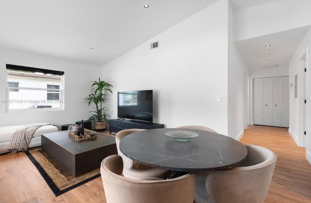 309 SE 3rd Ave, Hallandale Beach, FL 33009 - living area with vaulted ceiling, light wood-style floors, and recessed lighting