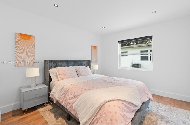 309 SE 3rd Ave, Hallandale Beach, FL 33009 - bedroom featuring wood finished floors and recessed lighting
