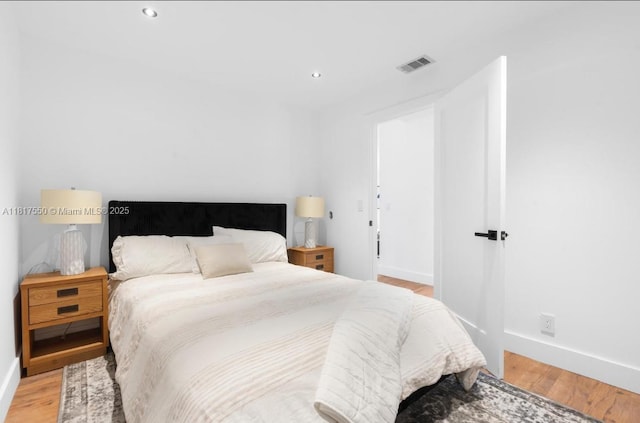 309 SE 3rd Ave, Hallandale Beach, FL 33009 - bedroom featuring light wood finished floors and recessed lighting