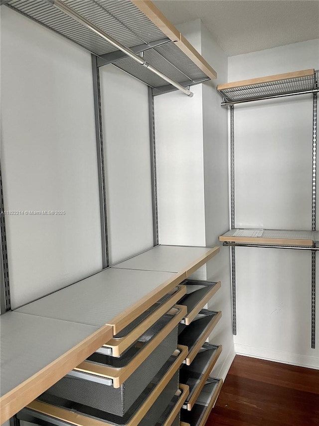 1155 Brickell Bay Dr, Miami, FL 33131 - spacious closet with wood finished floors