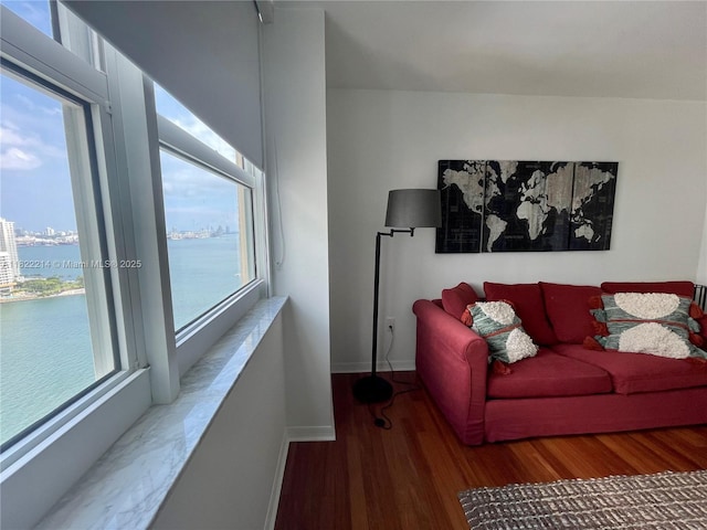 1155 Brickell Bay Dr, Miami, FL 33131 - living room featuring wood finished floors and a water view