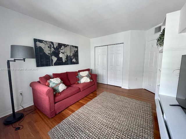 1155 Brickell Bay Dr, Miami, FL 33131 - living area featuring wood finished floors and baseboards