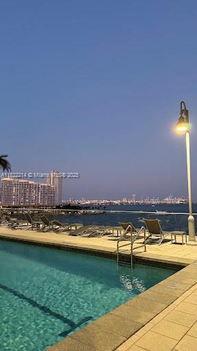 1155 Brickell Bay Dr, Miami, FL 33131 - community pool with a water view
