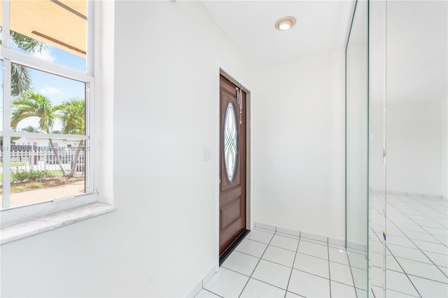 30 E 52nd Pl, Hialeah, FL 33013 - entryway with light tile patterned flooring