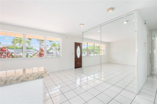 30 E 52nd Pl, Hialeah, FL 33013 - foyer featuring light tile patterned floors and recessed lighting