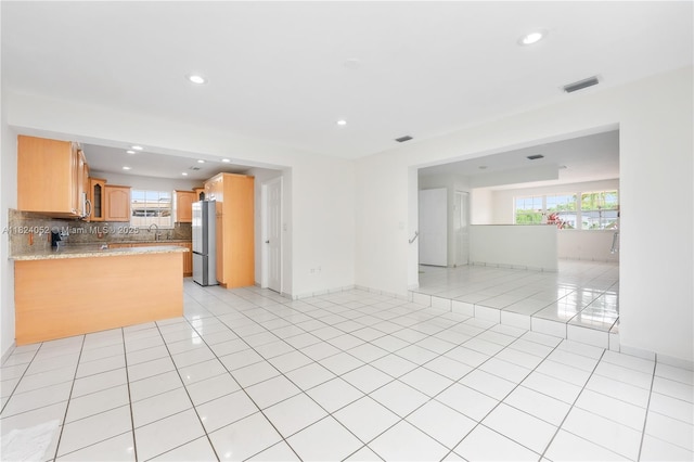30 E 52nd Pl, Hialeah, FL 33013 - unfurnished living room featuring recessed lighting and light tile patterned floors