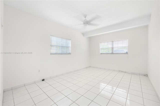 30 E 52nd Pl, Hialeah, FL 33013 - empty room with ceiling fan and light tile patterned flooring