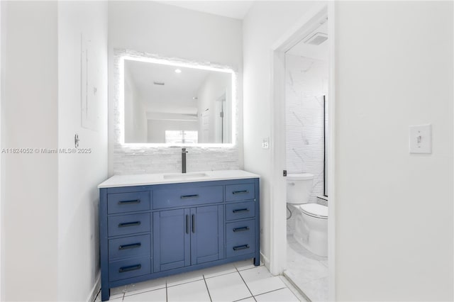 30 E 52nd Pl, Hialeah, FL 33013 - bathroom with vanity and tasteful backsplash