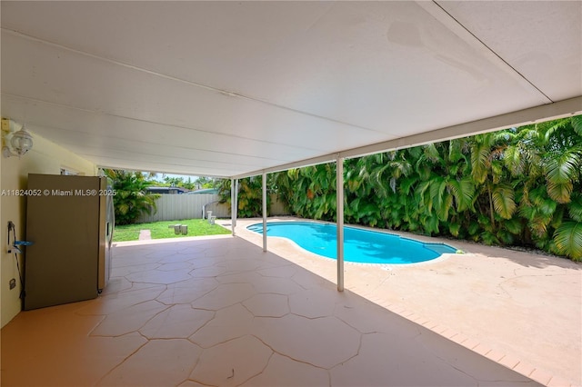 30 E 52nd Pl, Hialeah, FL 33013 - view of swimming pool with a patio and a fenced backyard