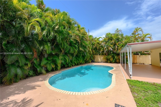 30 E 52nd Pl, Hialeah, FL 33013 - view of swimming pool with a patio and a fenced backyard
