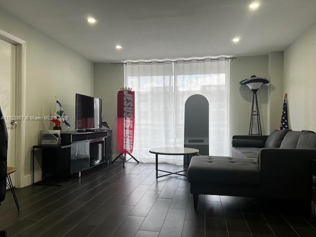 14165 SW 87th St Unit D202, Miami, FL 33183 - living area featuring dark wood-style flooring and recessed lighting
