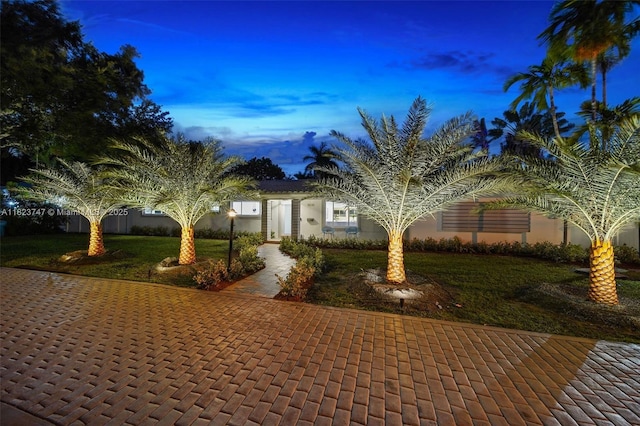 11530 NE 7th Ave, Biscayne Park, FL 33161 - obstructed view of property with a front lawn