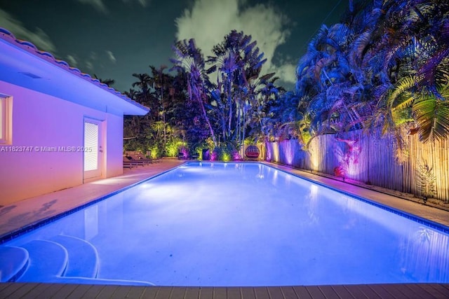11530 NE 7th Ave, Biscayne Park, FL 33161 - view of pool at twilight