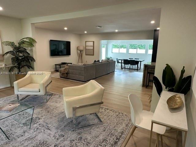 11530 NE 7th Ave, Biscayne Park, FL 33161 - living area with wood finished floors and recessed lighting