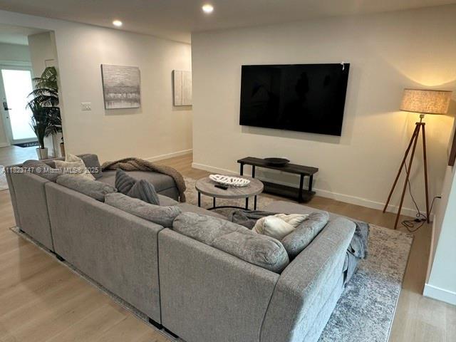 11530 NE 7th Ave, Biscayne Park, FL 33161 - living room with wood finished floors and recessed lighting