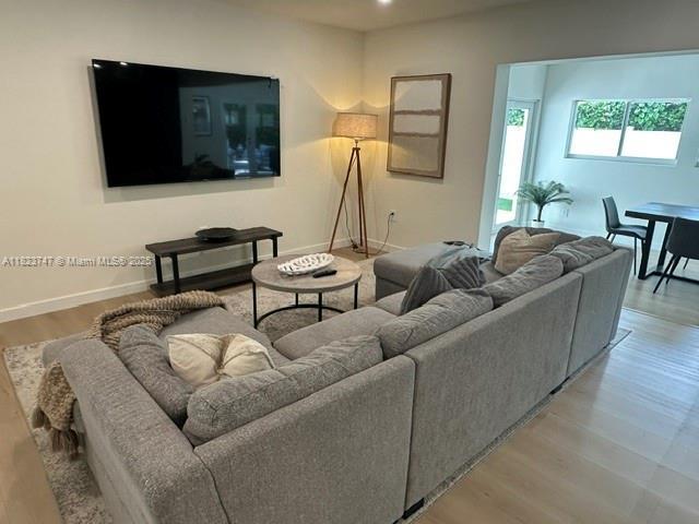 11530 NE 7th Ave, Biscayne Park, FL 33161 - living area with wood finished floors and recessed lighting