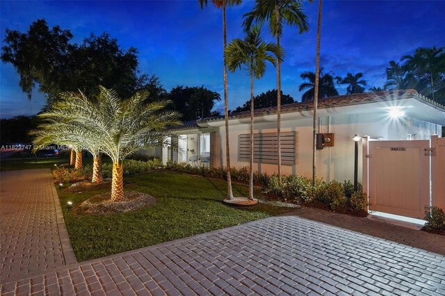 11530 NE 7th Ave, Biscayne Park, FL 33161 - exterior space featuring a front lawn