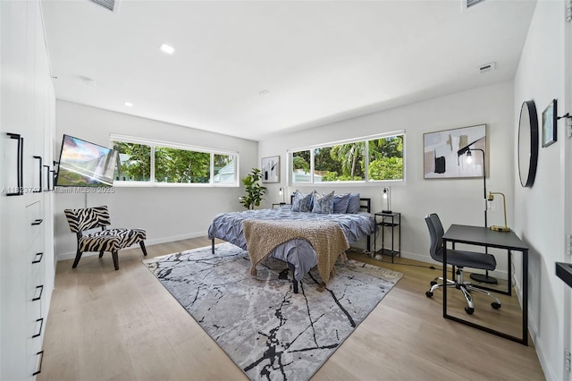 11530 NE 7th Ave, Biscayne Park, FL 33161 - bedroom featuring light wood finished floors, an office area, and recessed lighting