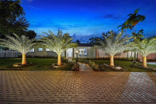 11530 NE 7th Ave, Biscayne Park, FL 33161 - view of front of home featuring a front lawn