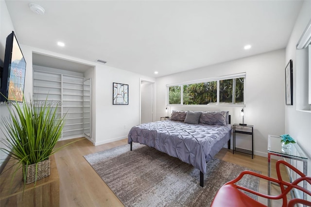 11530 NE 7th Ave, Biscayne Park, FL 33161 - bedroom featuring wood finished floors and recessed lighting