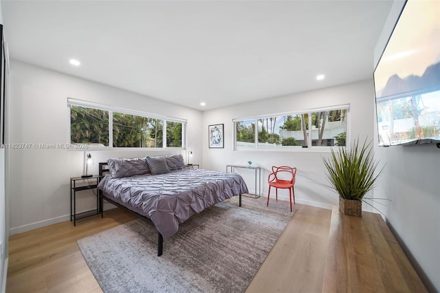 11530 NE 7th Ave, Biscayne Park, FL 33161 - bedroom with wood finished floors and recessed lighting
