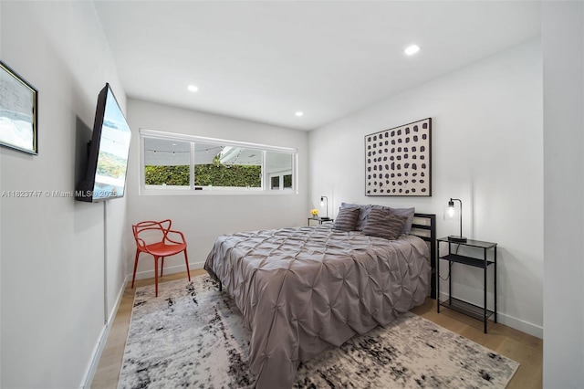 11530 NE 7th Ave, Biscayne Park, FL 33161 - bedroom with wood finished floors and recessed lighting