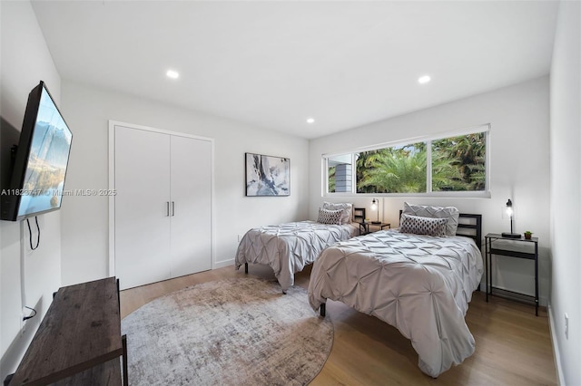11530 NE 7th Ave, Biscayne Park, FL 33161 - bedroom featuring wood finished floors and recessed lighting
