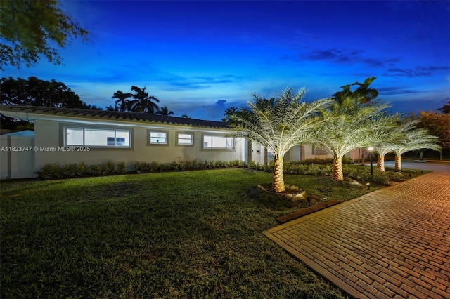 11530 NE 7th Ave, Biscayne Park, FL 33161 - view of front of property featuring stucco siding and a front yard