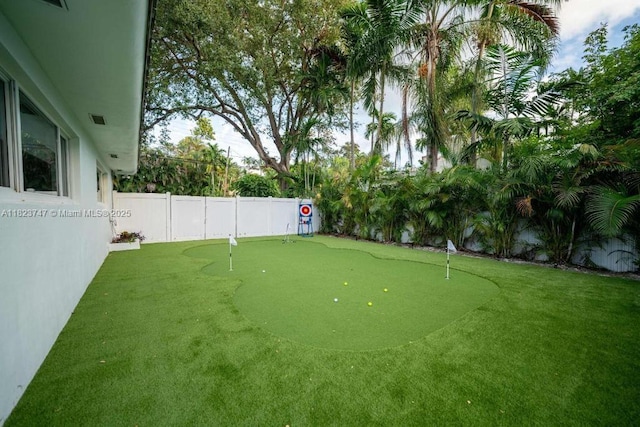 11530 NE 7th Ave, Biscayne Park, FL 33161 - fenced backyard featuring a putting green