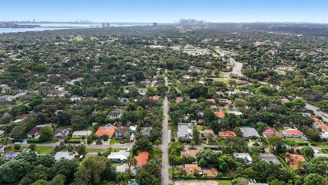 11530 NE 7th Ave, Biscayne Park, FL 33161 - aerial view of property and surrounding area featuring a nearby body of water and nearby suburban area