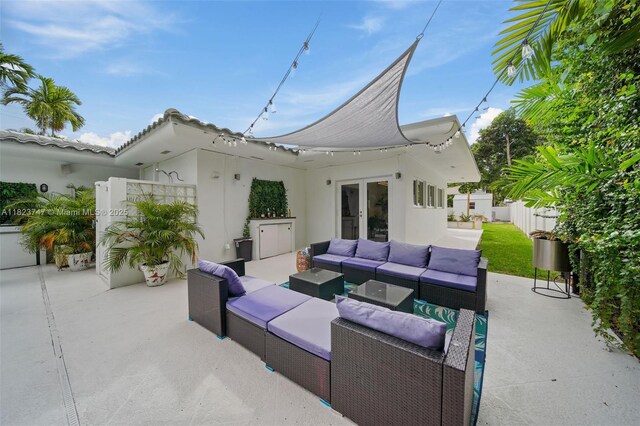 11530 NE 7th Ave, Biscayne Park, FL 33161 - view of patio / terrace featuring french doors and outdoor lounge area