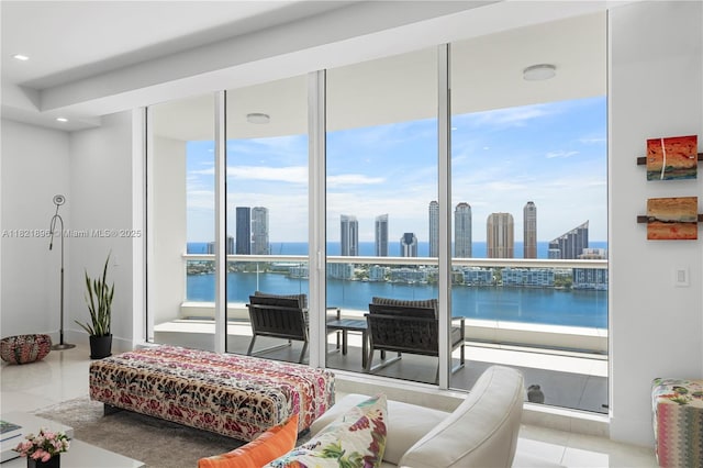 6000 Island Blvd Unit Ph7, Aventura, FL 33160 - bedroom featuring a skyline view, tile patterned flooring, a water view, floor to ceiling windows, and access to outside