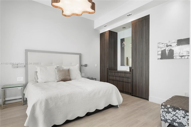 6000 Island Blvd Unit Ph7, Aventura, FL 33160 - bedroom with light wood-style floors