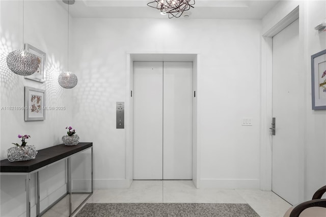 6000 Island Blvd Unit Ph7, Aventura, FL 33160 - hallway featuring elevator and baseboards