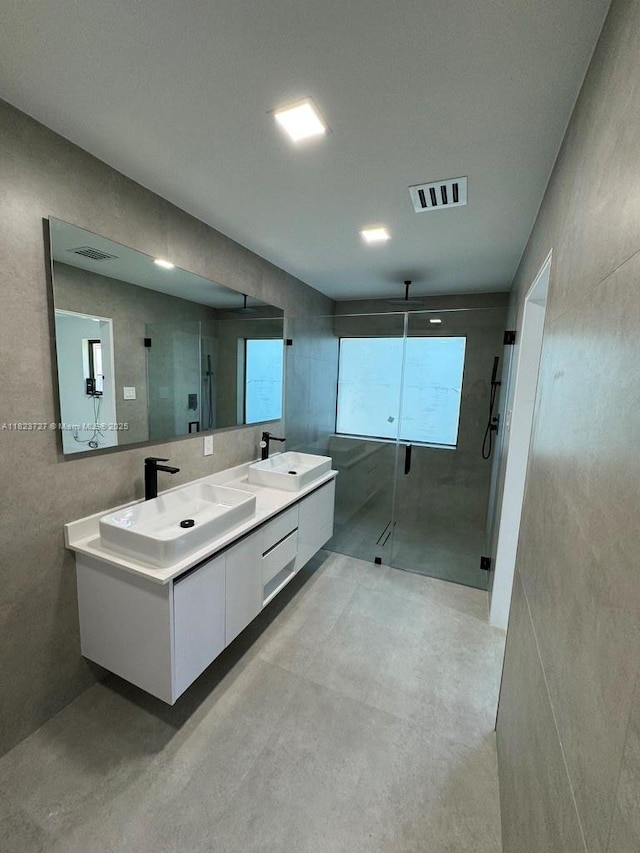 1205 Wallace St, Coral Gables, FL 33134 - full bath featuring a stall shower, double vanity, and concrete floors