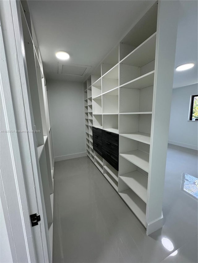 1205 Wallace St, Coral Gables, FL 33134 - walk in closet featuring attic access