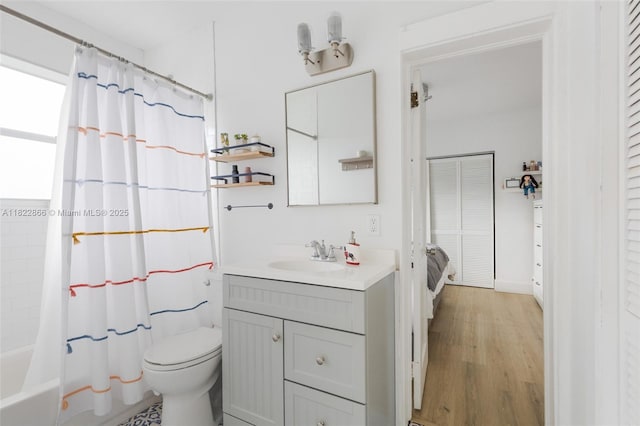 3422 SW 25th St, Miami, FL 33133 - bathroom featuring vanity, wood finished floors, and shower / bath combo