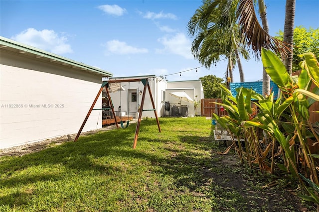 3422 SW 25th St, Miami, FL 33133 - fenced backyard with a playground