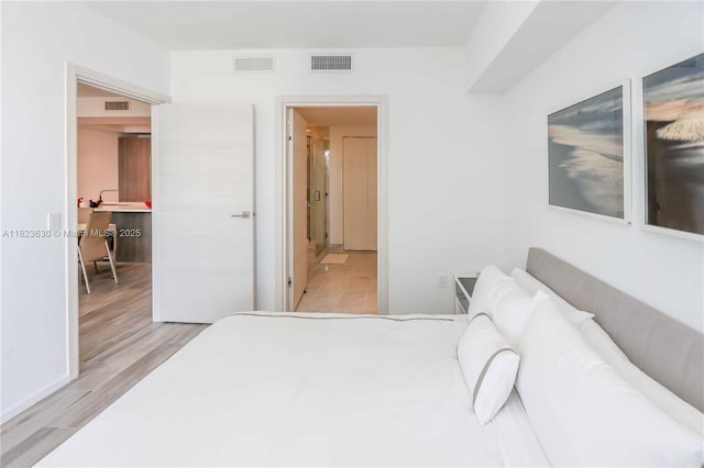 801 S Miami Ave Unit 3108, Miami, FL 33130 - bedroom featuring light wood-style flooring