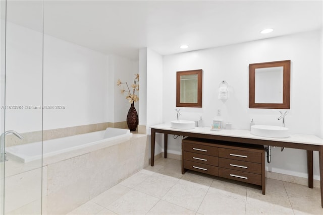 465 Brickell Ave Unit 2003, Miami, FL 33131 - full bathroom with double vanity, a garden tub, tile patterned floors, and recessed lighting