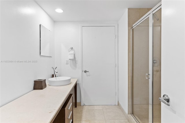 465 Brickell Ave Unit 2003, Miami, FL 33131 - bathroom with vanity, a stall shower, tile patterned floors, and recessed lighting