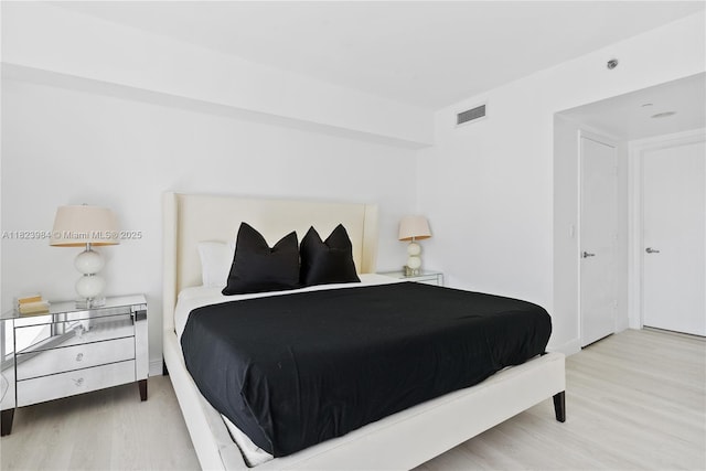 465 Brickell Ave Unit 2003, Miami, FL 33131 - bedroom featuring wood finished floors