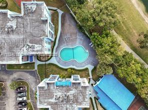 9440 Fontainebleau Blvd Unit 203, Miami, FL 33172 - aerial view of property's location with a pool