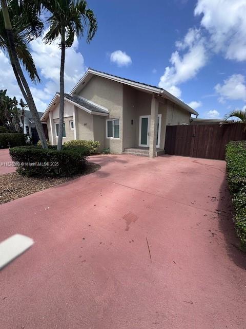 641 SW 99th Pl, Miami, FL 33174 - view of front of house with stucco siding