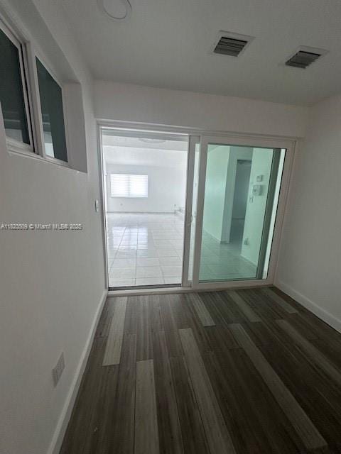 641 SW 99th Pl, Miami, FL 33174 - hallway featuring baseboards and wood finished floors